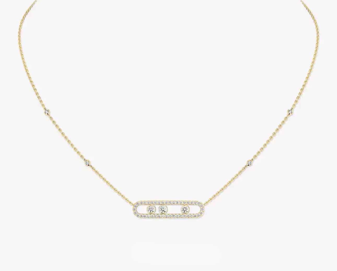 Gold necklace with a bar pendant on a white background