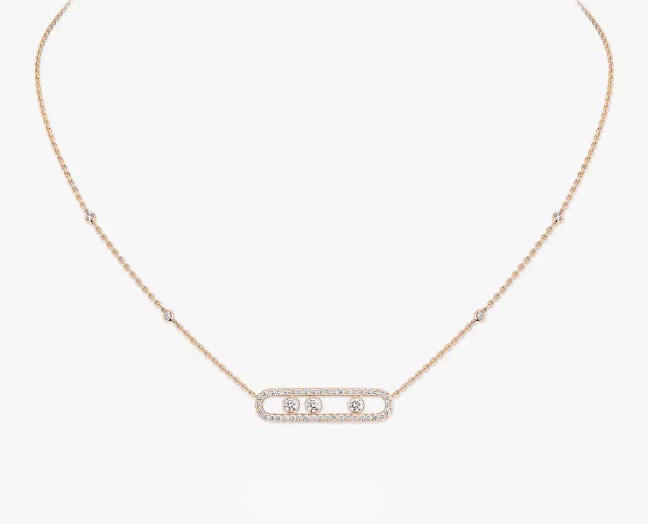 Rose gold necklace with a bar pendant on a white background