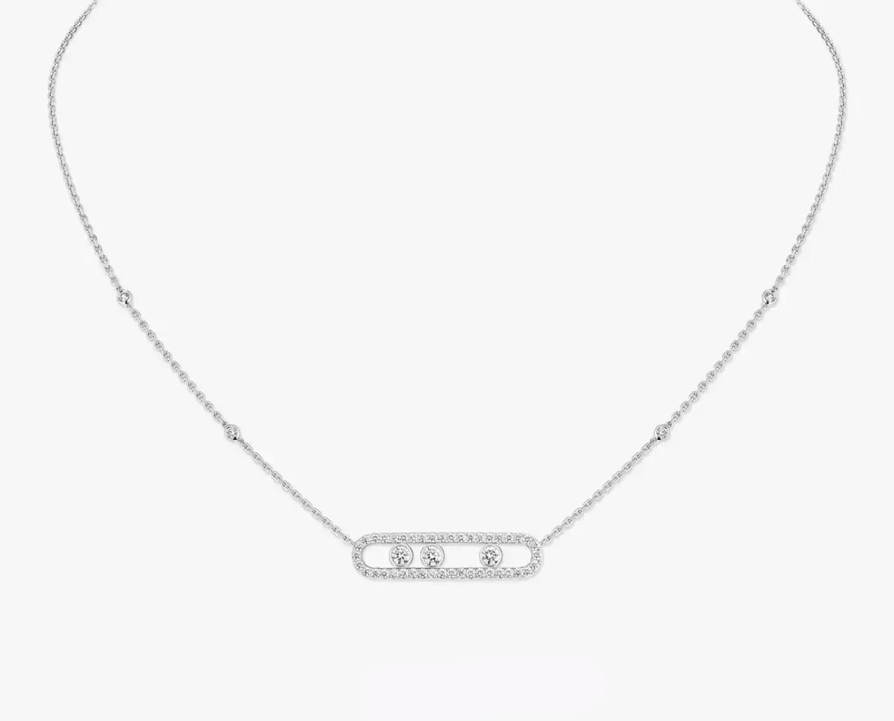 Silver necklace with a rectangular pendant on a white background