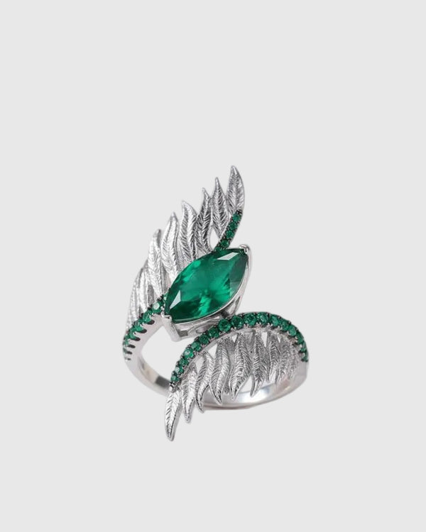 Front angled view of the Aetheria 925 solid silver cocktail ring featuring a 2.55ct marquise-cut natural forest green agate embraced by meticulously sculpted pavé wings.
