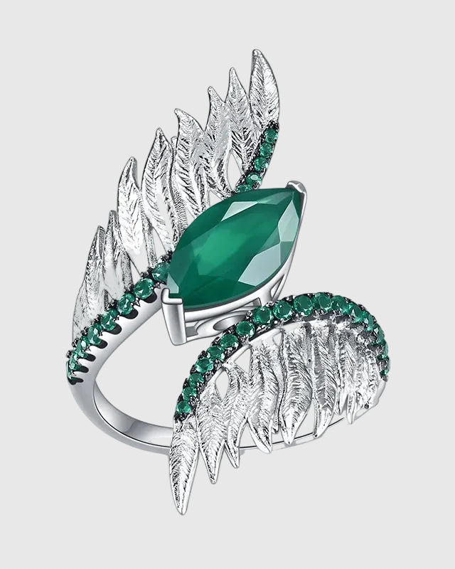 Front angled view of the Aetheria 925 solid silver cocktail ring featuring a 2.55ct marquise-cut natural forest green agate embraced by meticulously sculpted pavé wings.