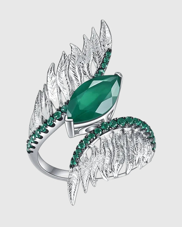 Front angled view of the Aetheria 925 solid silver cocktail ring featuring a 2.55ct marquise-cut natural forest green agate embraced by meticulously sculpted pavé wings.