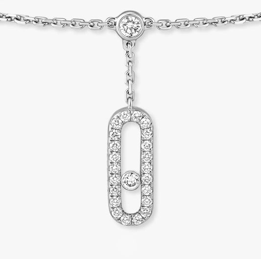 Silver necklace with a unique pendant on a white background