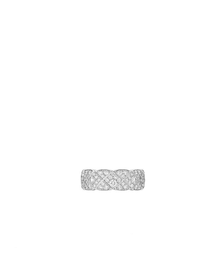 Front view of the rhodium-plated sterling silver Matelassé ring, highlighting the seamless "carpet of light" created by dozens of hand-set moissanite stones.