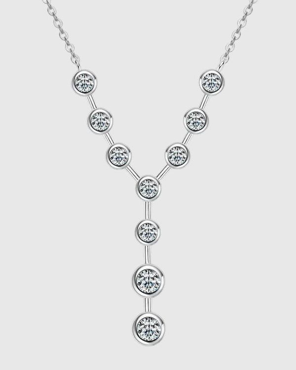 Front view of the rhodium-plated 925 sterling silver lariat necklace featuring brilliant D-color VVS1 moissanite stones in a vertical Y-shaped cascade.