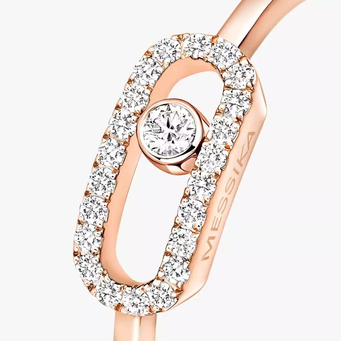 Rose Gold Move Uno ring with a diamond on a white background