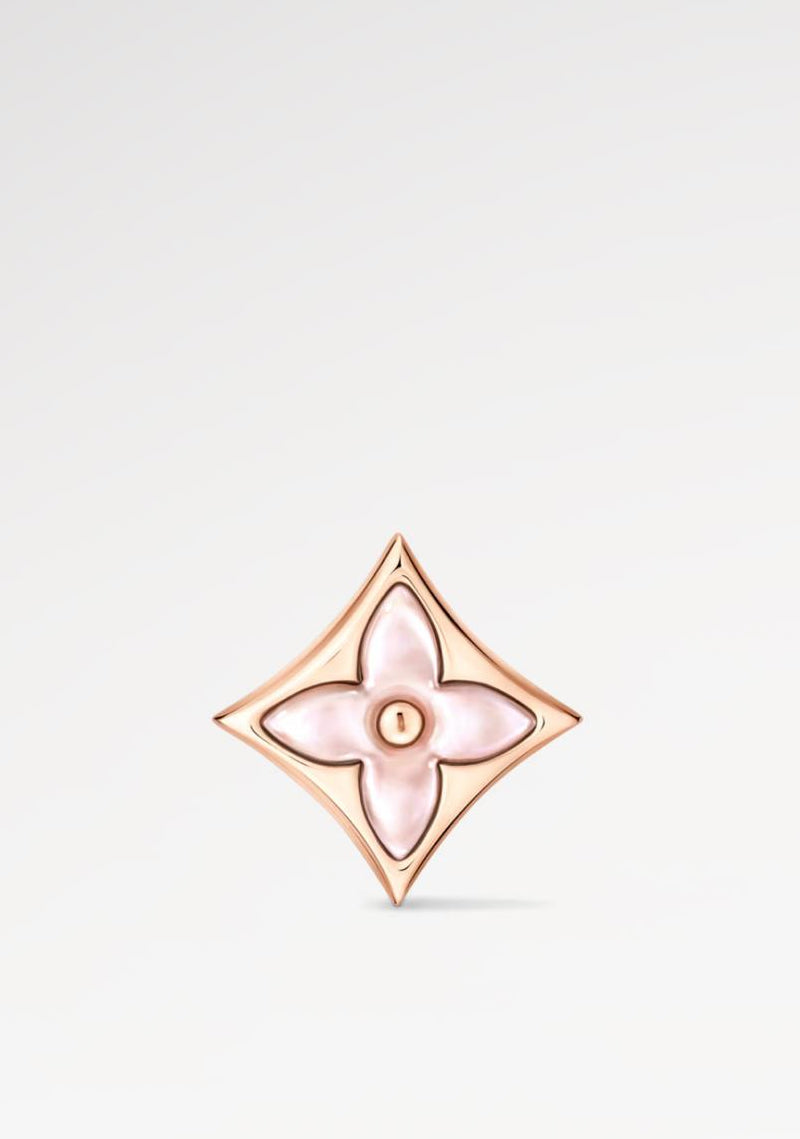 Rose gold and Mother of Pearl Star Earring Stud on a light gray background