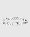 Angled studio shot of the men's heavy silver chain bracelet, demonstrating the substantial weight, mirror-polish finish, and precise equestrian-inspired craftsmanship.