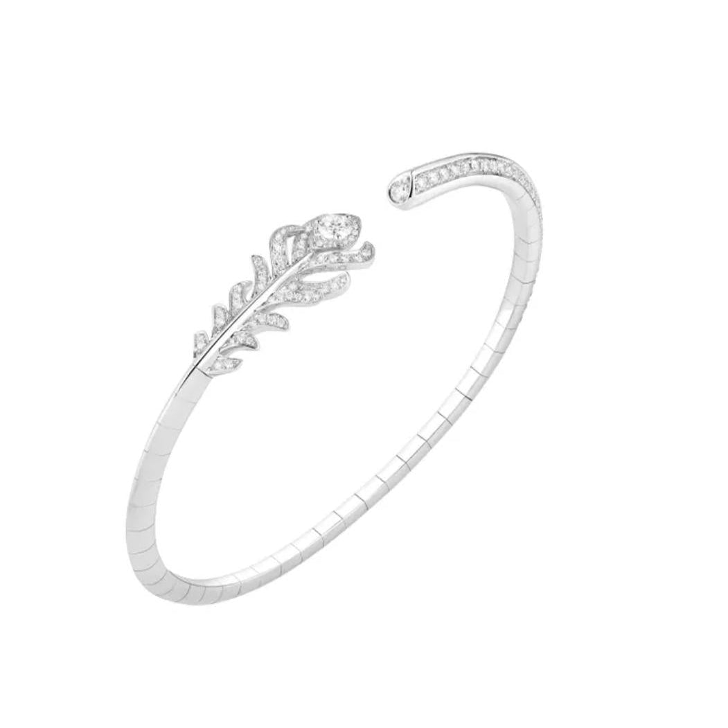 boucheron Silver bracelet with feather design on a white background