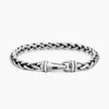 Silver chain bracelet on a white background