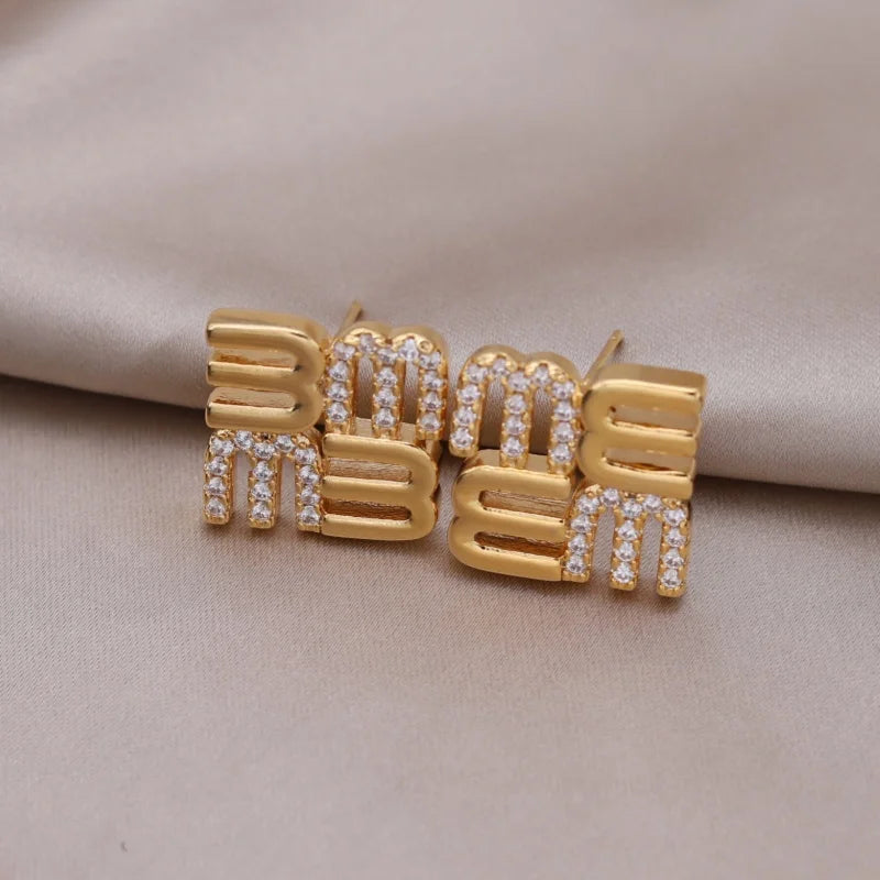 Mésara Earrings | 18K Gold Jewelry | “M” Initial Studs