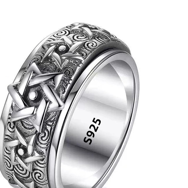 Silver ring with intricate design, 925 stamp, and 'Real Sterling Silver' label on a white background.