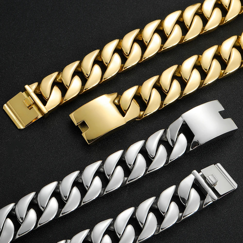 Gold and silver chain bracelets on a black background