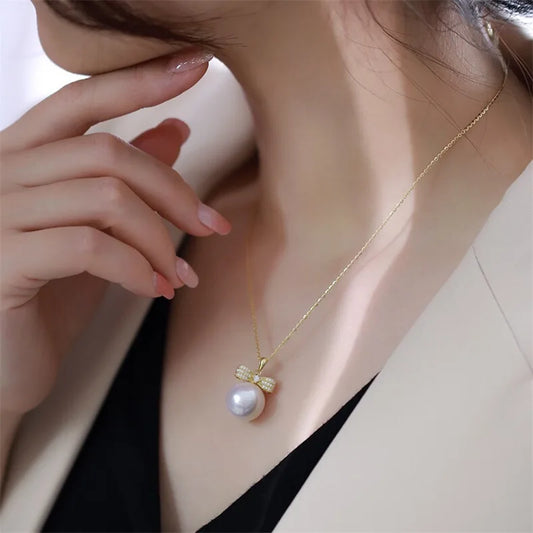 Veloura | Bow-Tied Pearl Pendant