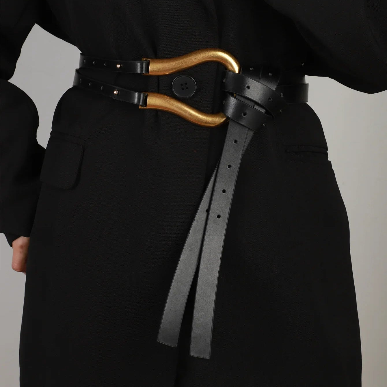 Veyrona | Sculpted Wave Buckle Elegance