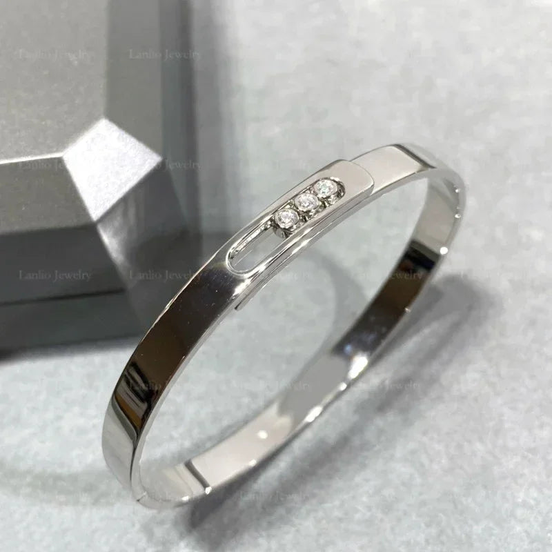 Move Noa Bangle | 18K Gold & Triple Floating Zircon