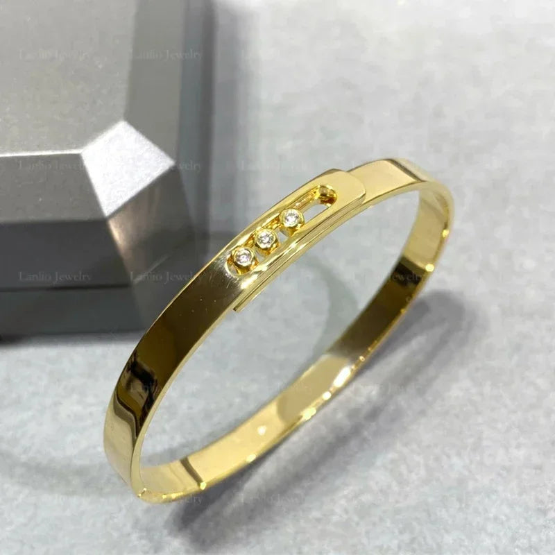 Move Noa Bangle | 18K Gold & Triple Floating Zircon