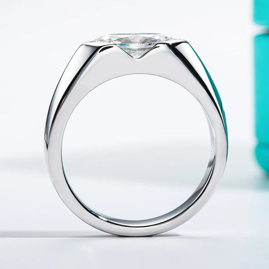 A marquise-cut moissanite ring with a 1ct D-color VVS1 clarity, set in sterling silver and plated in 18K white gold.