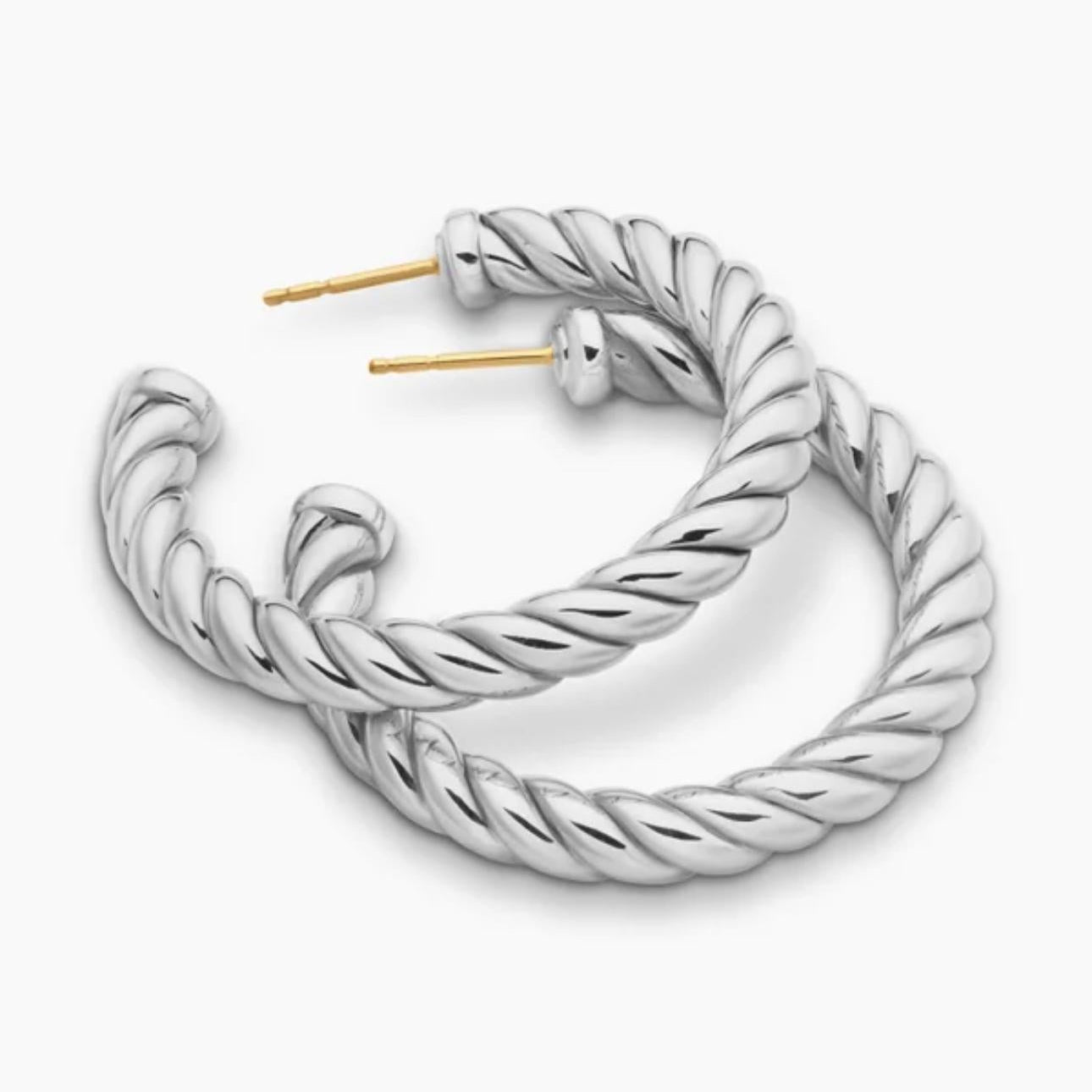 Pair of SCULPTED CABLE HOOP EARRINGS
Sterling Silver, 40mm on a white background