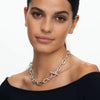 Woman wearing a Sterling Silver chain necklace with Diamonds, 11mm  on a white background