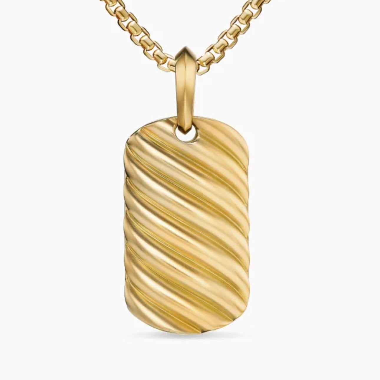 Gold textured pendant on a chain against a white background