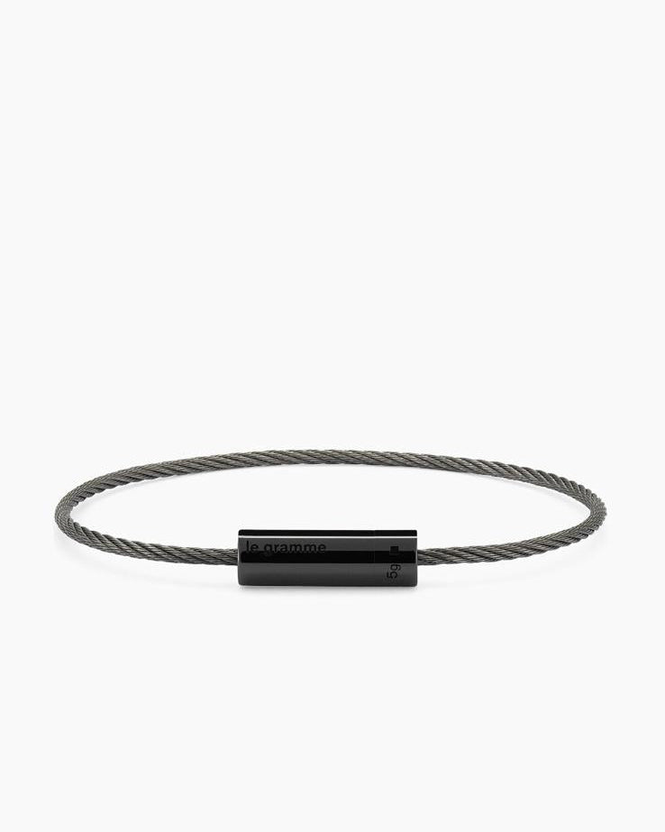 Le Gramme bracelet on a white background with  brand name displayed.