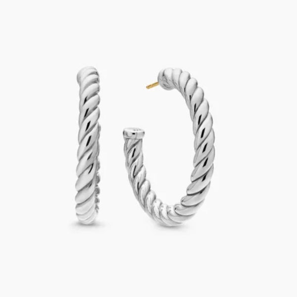 Pair of silver hoop earrings on a white background