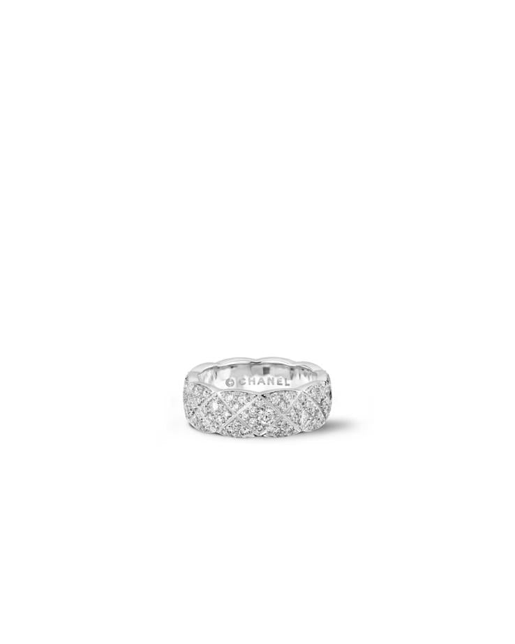 Angled studio shot of the silver quilted moissanite ring, emphasizing the elegant scalloped edges and the thick, substantial 7g solid silver build.