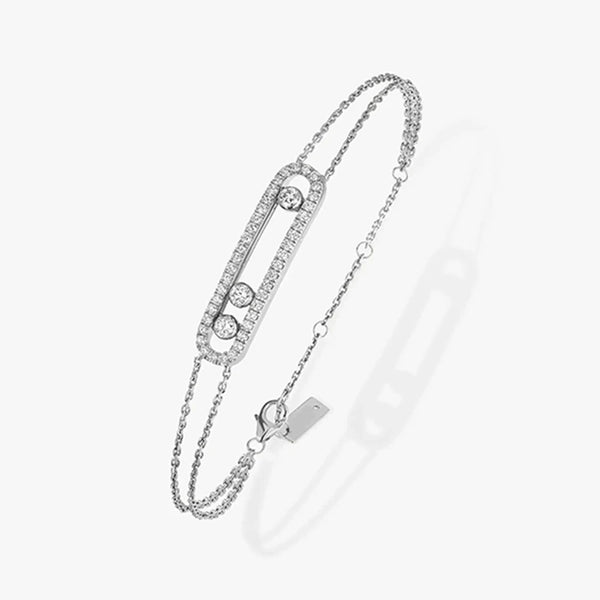 A luxury Move Uno bracelet  with a zircon centerpiece presented on a white background.