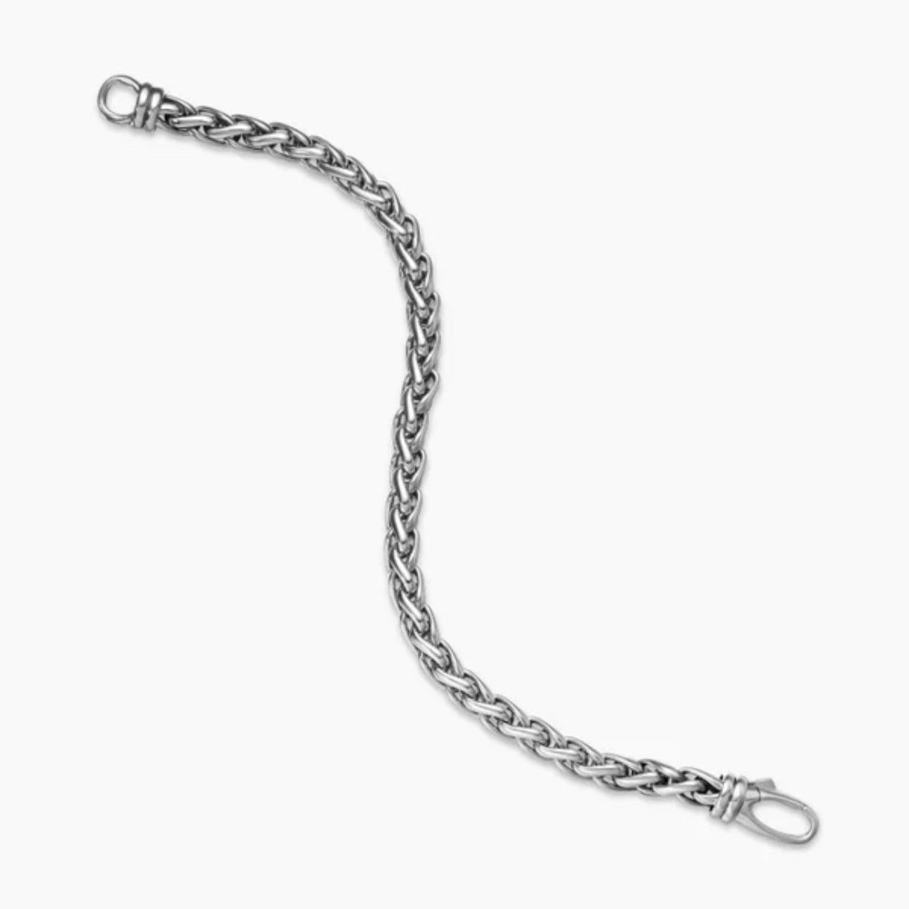 Silver chain bracelet on a white background
