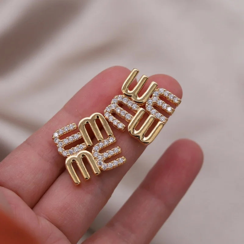 Mésara Earrings | 18K Gold Jewelry | “M” Initial Studs