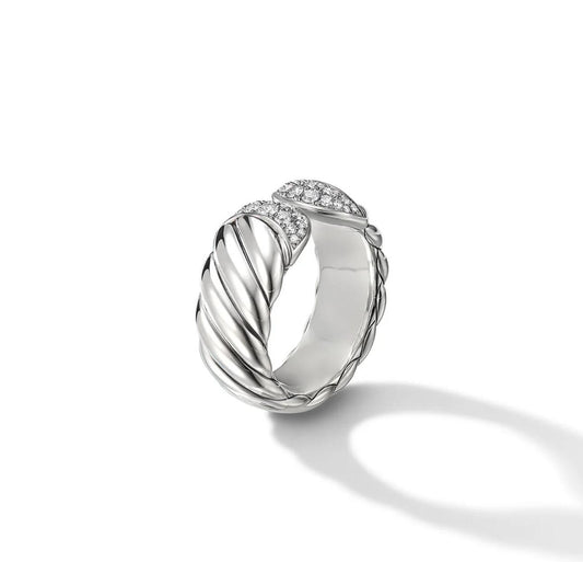 Silver ring with diamond accents on a white background