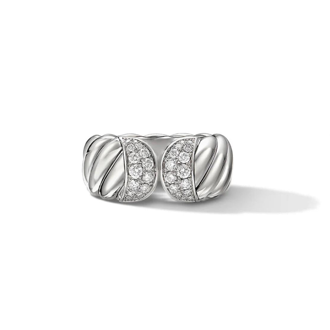 Silver ring with diamond accents on a white background