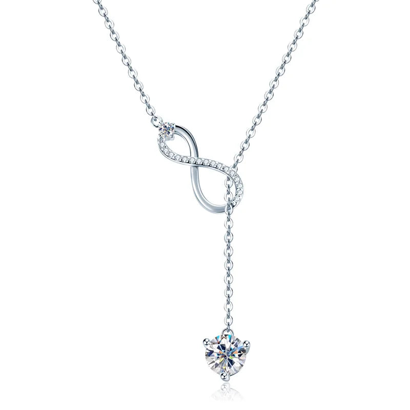 Silver necklace with a heart-shaped pendant on a white background