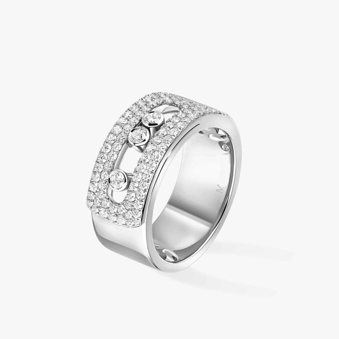 Silver ring with diamond accents on a white background
