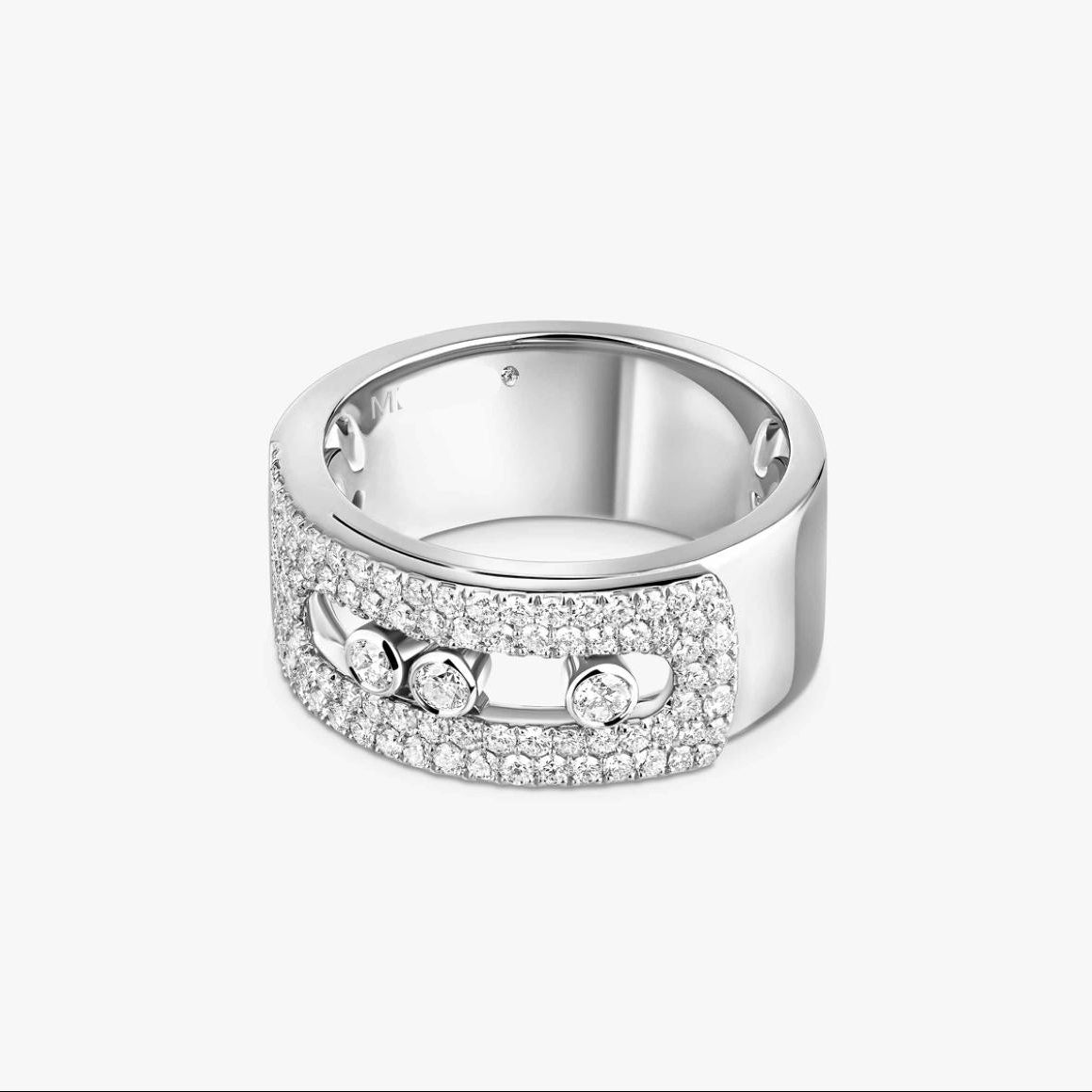 Silver ring with gemstones on a white background