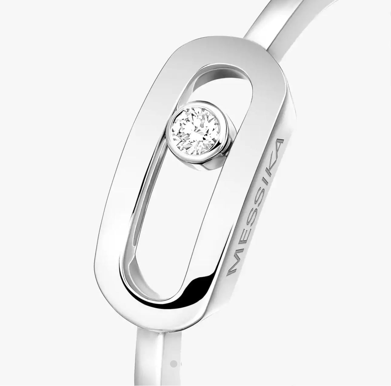 Silver Move Uno ring with a diamond  on a white background