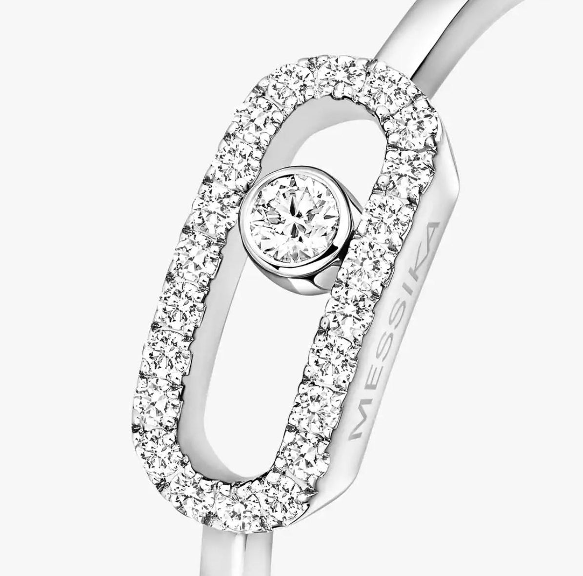 Silver Move Uno ring with a diamond on a white background