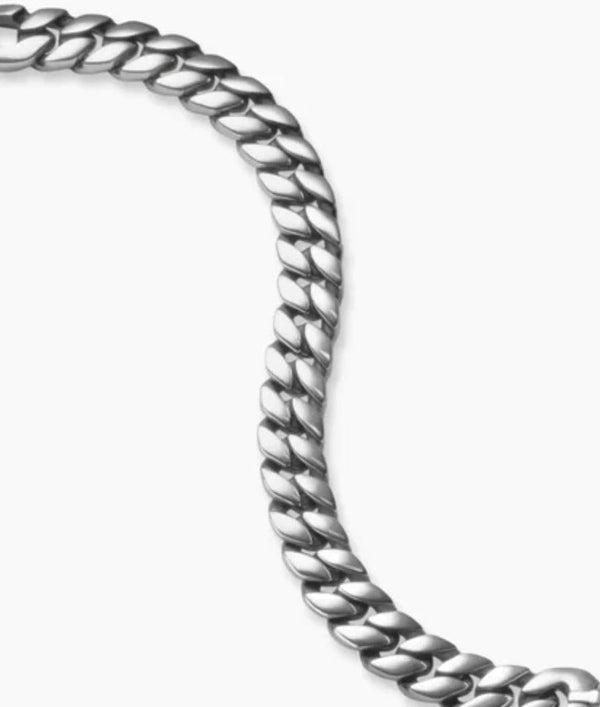 Silver chain bracelet on a white background