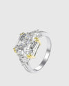 Angled studio shot of the solid Italian 925 silver engagement ring featuring a 4ct D-color princess-cut lab-grown diamond flanked by trillion-cut side stones.