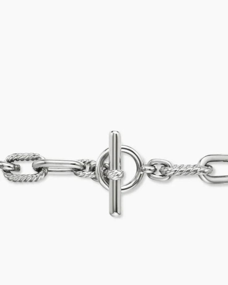 Extreme close-up of the front-facing toggle clasp on the Silver chain, showcasing the T-bar and circular loop.