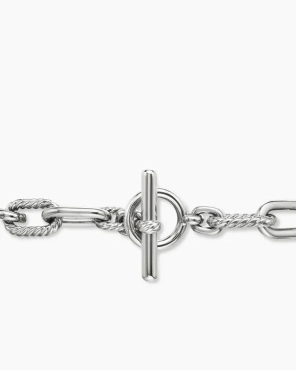 Extreme close-up of the front-facing toggle clasp on the Silver chain, showcasing the T-bar and circular loop.