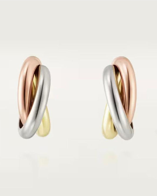Front view of the Harmonie Trio classic interlocking earrings, featuring smooth, high-polish 18K white, rose, and yellow gold-plated solid 925 silver rings.