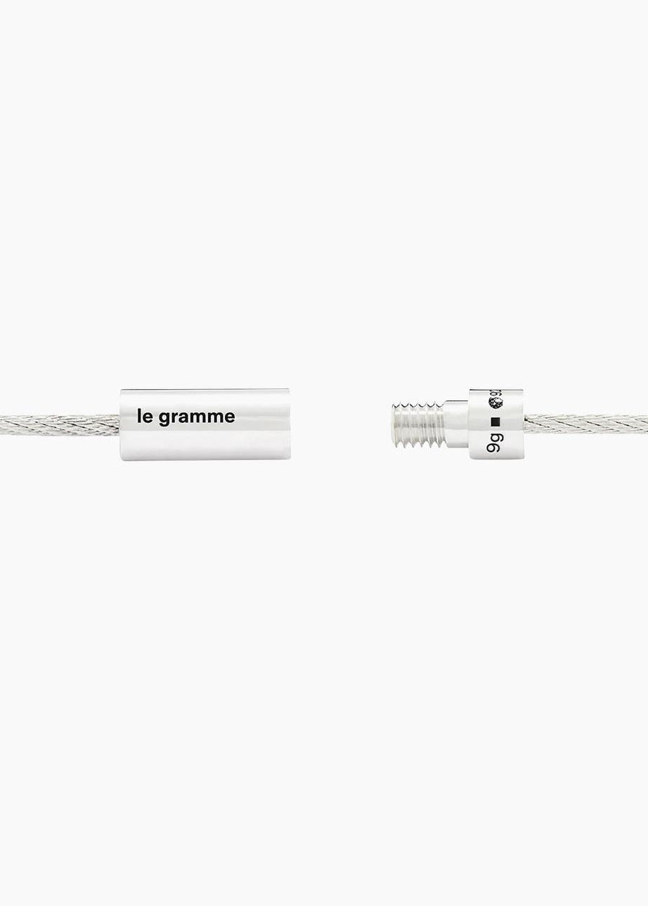 Two silver cables with 'le gramme' branding on a white background