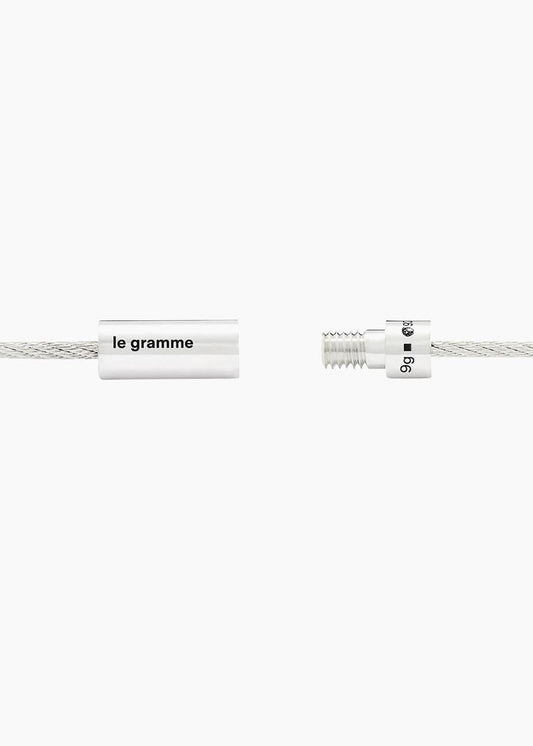 Two silver cables with 'le gramme' branding on a white background