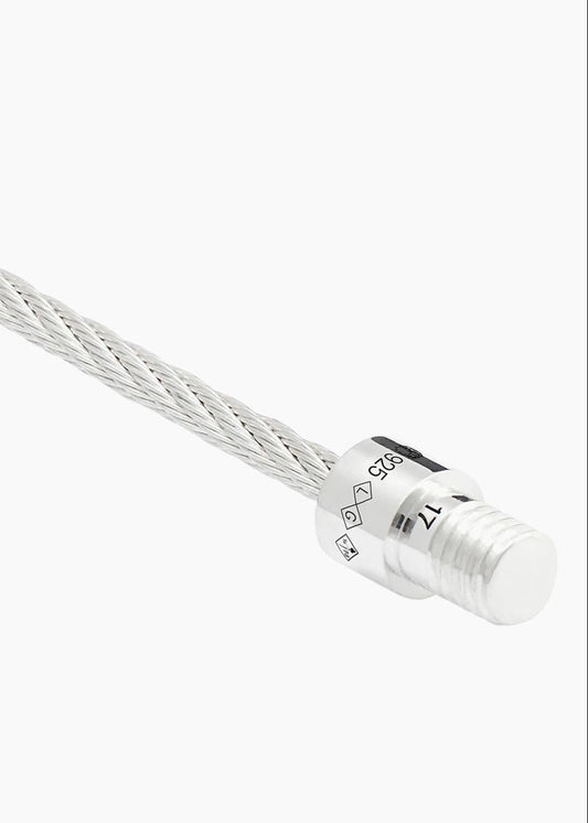 Silver cable with a connector on a white background