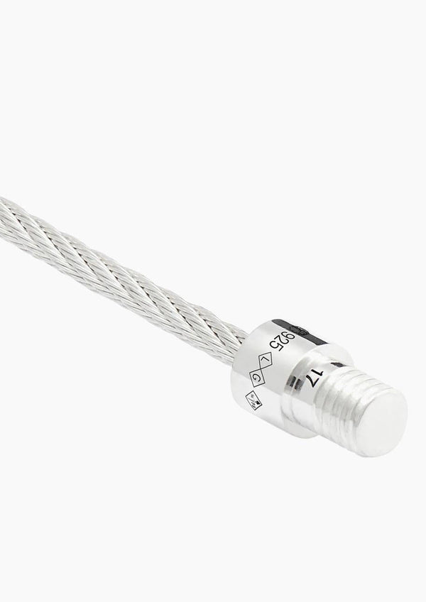 Silver cable with a connector on a white background