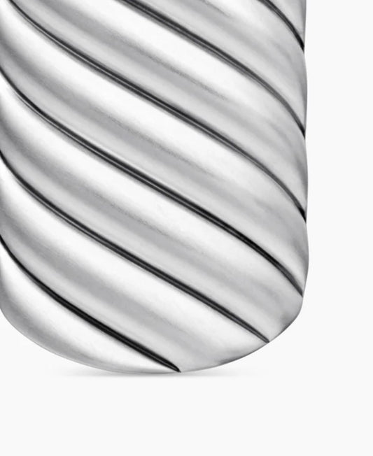 Close-up of the sterling silver tag pendant showing diagonal twisted grooves with a polished curved edge.