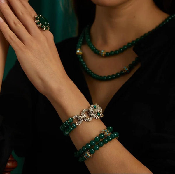 Panthéria — Emerald Gaze in Gold