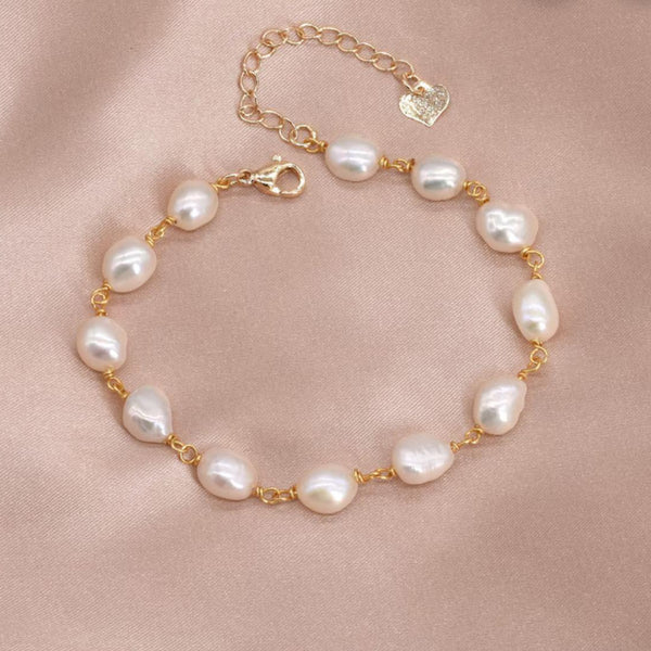 Auréline — Pearls in Golden Motion